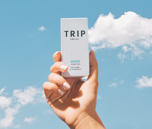Hand holding mint CBD oil 1000MG