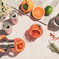 CBD cocktail imagery with fruit