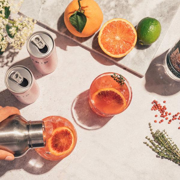 CBD cocktail imagery with fruit